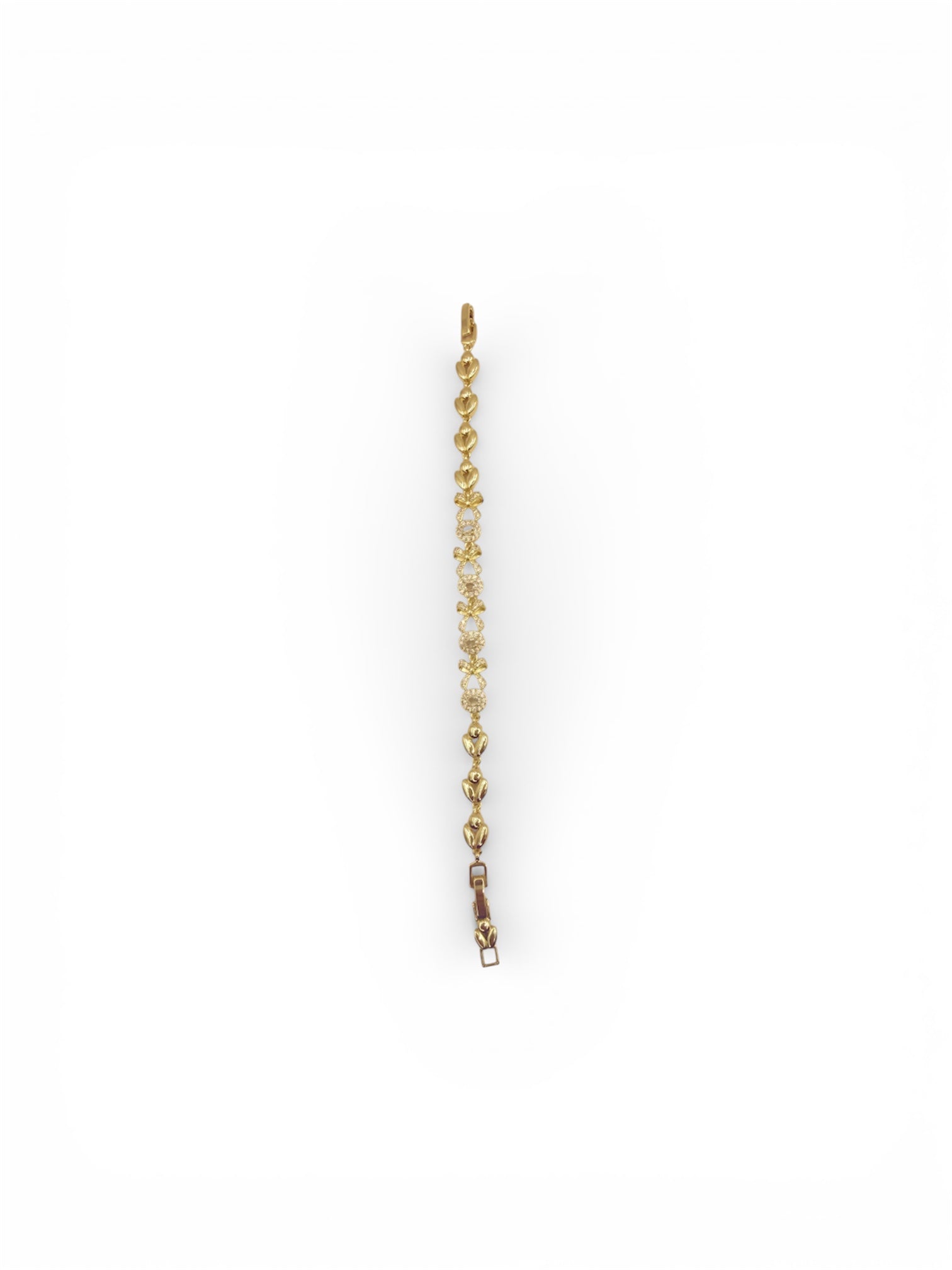 Elegantes Armband mit Herz- und Blütenelementen – Goldfarben